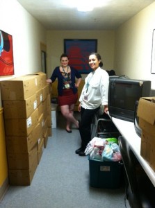Students Victoria Duverge  and Delana Baldwin making a delivery.