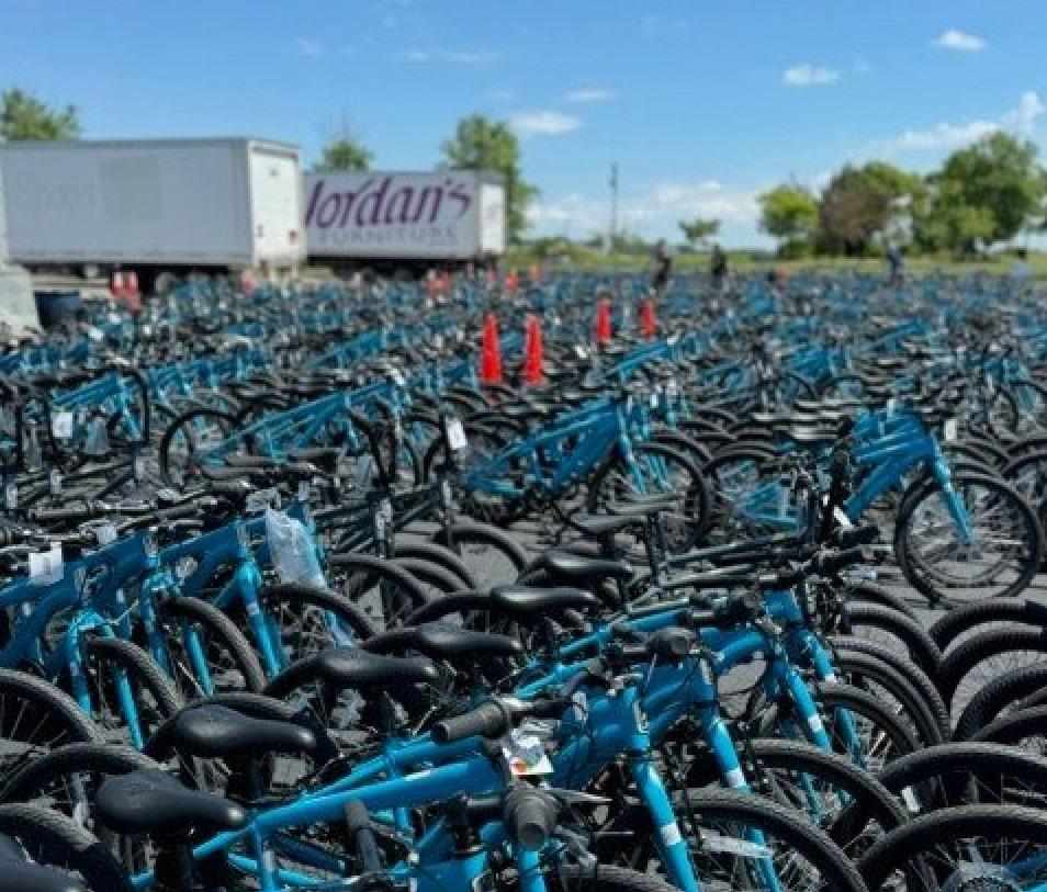 Taunton’s Jordan’s Furniture donates 100 bicycles to kids at ten