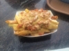 New Bedford french fries topped with linguica and melted cheese