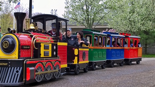 Mayor Jon Mitchell takes a ride on the Black Bear Express at the Buttonwood Park Zoo - photo by Josh St Germain.